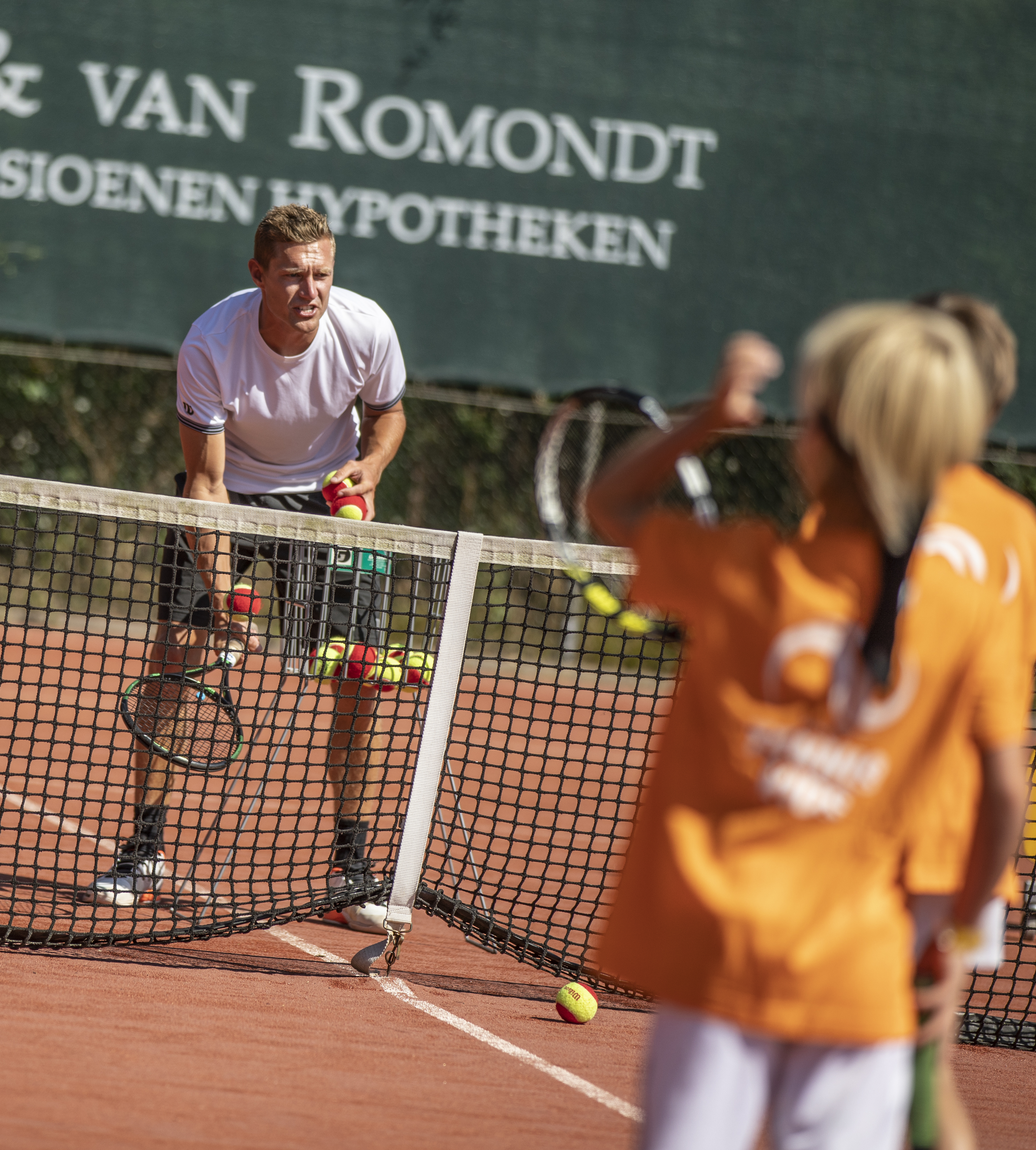 Tennis kinderen les van leraar